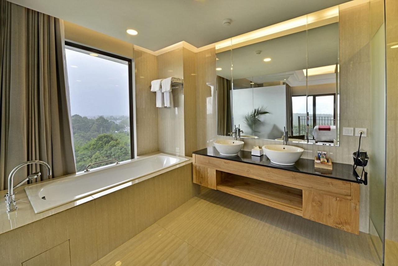 Famvida Hotel Lubuklinggau Bilik gambar